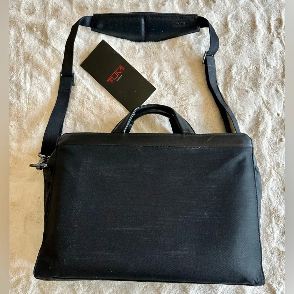 Tumi Large Black Leather laptop briefcase. Vntg. I owned since 2000. Preowned